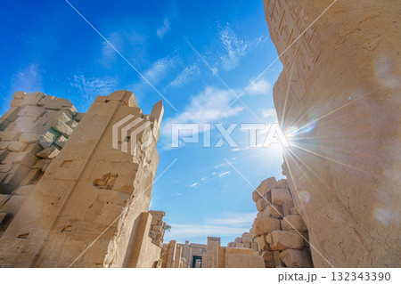 Sunburst Over Ancient Ruins at Temple of Karnak in Luxor Egypt. 132343390