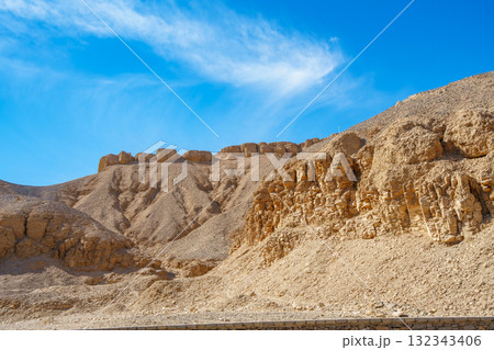 Valley of the Kings Arid Mountain Desert Landscape Luxor Egypt Blue Sky. 132343406