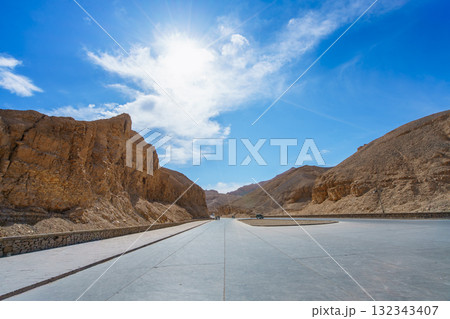 Paved Road through Rocky Desert Hills at Valley of the Kings Luxor Egypt. Paved Road through Rocky Desert Hills at Valley of the Kings Luxor Egypt. 132343407
