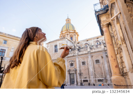 Happy Tourist with Sicilian Cannolo 132345634
