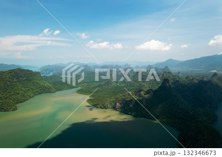 Top view of the green mountains and river in KILIM Geopark on a sunny day with a clear sky. Langkawi. Malaysia 132346673