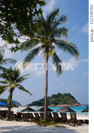 Spectacular scenic view of Long Beach with sun loungers on Redang Island on a sunny day, Malaysia Spectacular scenic view of Long Beach with sun loungers on Redang Island on a sunny day, Malaysia 132346765
