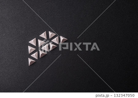 Anti-tank barrier or dragon's teeth made of concrete and iron as a fortification. Dragon's teeth 132347050