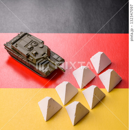 Anti-tank barrier or dragon's teeth made of concrete and iron as a fortification. Dragon's teeth Anti-tank barrier or dragon's teeth made of concrete and iron as a fortification. Dragon's teeth 132347097