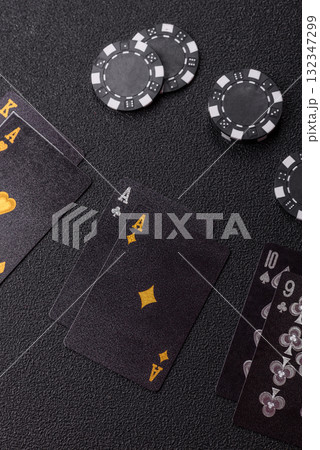 Playing blackjack or baccarat card game in casino with chips, bets and risk. Cards and chips Playing blackjack or baccarat card game in casino with chips, bets and risk. Cards and chips 132347299