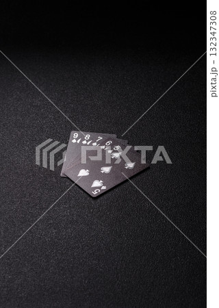 Playing card game poker in casino with chips, bets and risk. Cards and chips Playing card game poker in casino with chips, bets and risk. Cards and chips 132347308