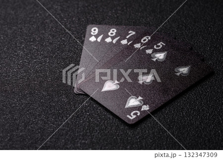 Playing card game poker in casino with chips, bets and risk. Cards and chips 132347309