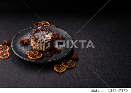 Sweet tart, pie with chocolate and cream with fruit filling on a plate. Chocolate tart Sweet tart, pie with chocolate and cream with fruit filling on a plate. Chocolate tart 132347570