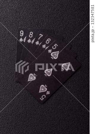 Playing card game poker in casino with chips, bets and risk. Cards and chips 132347581