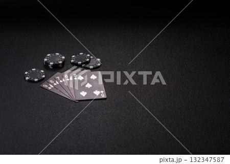 Playing card game poker in casino with chips, bets and risk. Cards and chips 132347587