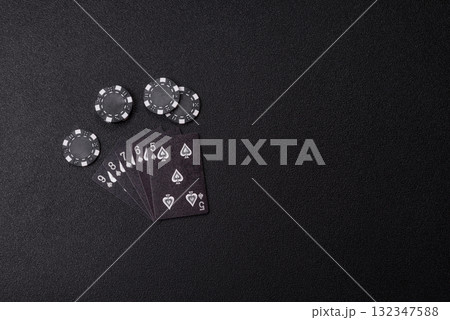 Playing card game poker in casino with chips, bets and risk. Cards and chips 132347588