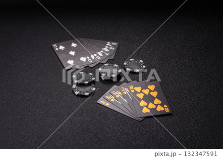 Playing card game poker in casino with chips, bets and risk. Cards and chips 132347591