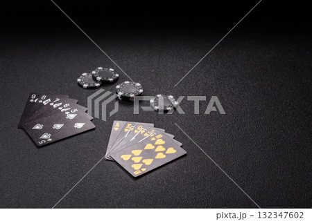 Playing card game poker in casino with chips, bets and risk. Cards and chips Playing card game poker in casino with chips, bets and risk. Cards and chips 132347602