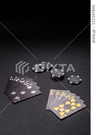 Playing card game poker in casino with chips, bets and risk. Cards and chips 132347605