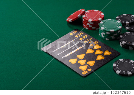 Playing card game poker in casino with chips, bets and risk. Cards and chips 132347610