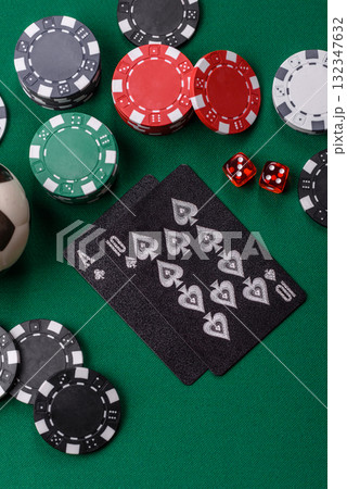Playing blackjack or baccarat card game in casino with chips, bets and risk. Cards and chips Playing blackjack or baccarat card game in casino with chips, bets and risk. Cards and chips 132347632