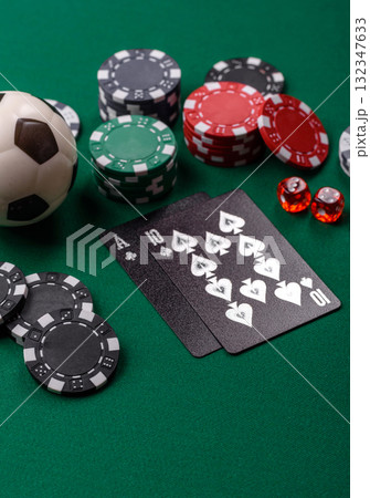 Playing blackjack or baccarat card game in casino with chips, bets and risk. Cards and chips Playing blackjack or baccarat card game in casino with chips, bets and risk. Cards and chips 132347633
