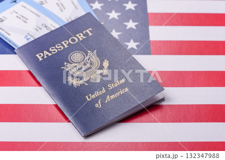 US passport or id document with tickets for flight, travel, border crossing. US passport and tickets US passport or id document with tickets for flight, travel, border crossing. US passport and tickets 132347988