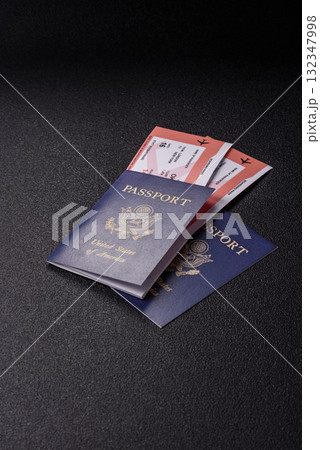 US passport or id document with tickets for flight, travel, border crossing. US passport and tickets 132347998