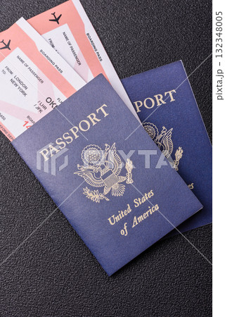 US passport or id document with tickets for flight, travel, border crossing. US passport and tickets 132348005