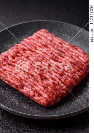 Raw minced beef or pork, ground meat for burgers. Raw minced meat Raw minced beef or pork, ground meat for burgers. Raw minced meat 132348050