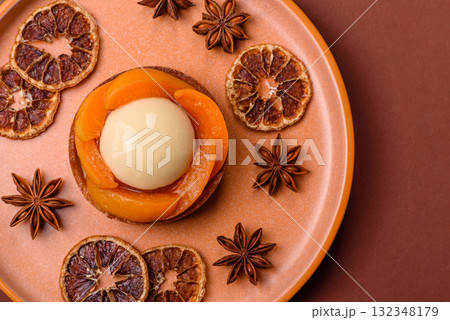Pie, sweet round tart with apricot pieces, cream and nuts. Sweet tart with peach Pie, sweet round tart with apricot pieces, cream and nuts. Sweet tart with peach 132348179