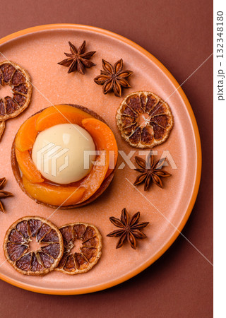 Pie, sweet round tart with apricot pieces, cream and nuts. Sweet tart with peach Pie, sweet round tart with apricot pieces, cream and nuts. Sweet tart with peach 132348180