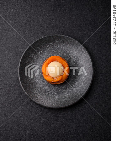 Pie, sweet round tart with apricot pieces, cream and nuts. Sweet tart with peach 132348199