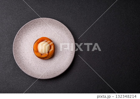 Pie, sweet round tart with apricot pieces, cream and nuts. Sweet tart with peach Pie, sweet round tart with apricot pieces, cream and nuts. Sweet tart with peach 132348214