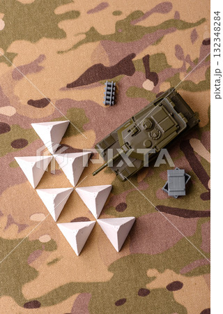 Anti-tank barrier or dragon's teeth made of concrete and iron as a fortification. Dragon's teeth Anti-tank barrier or dragon's teeth made of concrete and iron as a fortification. Dragon's teeth 132348284