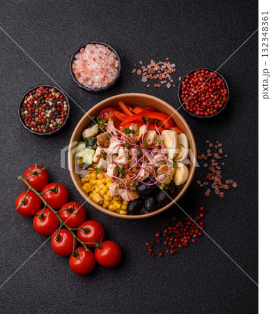 Bowl with chicken pieces, rice, tomatoes, peppers and microgreens. Bowl with chicken Bowl with chicken pieces, rice, tomatoes, peppers and microgreens. Bowl with chicken 132348361