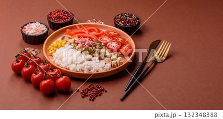 Bowl with chicken pieces, rice, tomatoes, peppers and microgreens. Bowl with chicken Bowl with chicken pieces, rice, tomatoes, peppers and microgreens. Bowl with chicken 132348388
