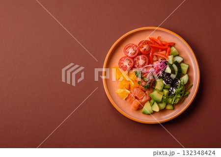 Bowl with salmon pieces, cheese, tomatoes, peppers and avocado. Salmon bowl Bowl with salmon pieces, cheese, tomatoes, peppers and avocado. Salmon bowl 132348424