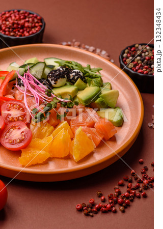 Bowl with salmon pieces, cheese, tomatoes, peppers and avocado. Salmon bowl 132348434