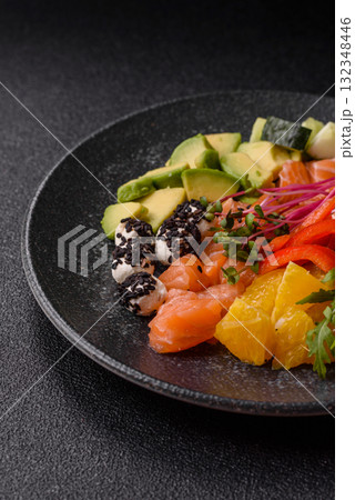 Bowl with salmon pieces, cheese, tomatoes, peppers and avocado. Salmon bowl Bowl with salmon pieces, cheese, tomatoes, peppers and avocado. Salmon bowl 132348446