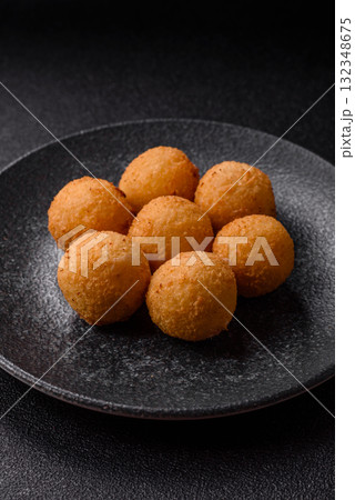 Cheese balls, croquettes or arancini with potatoes or rice. Cheese balls Cheese balls, croquettes or arancini with potatoes or rice. Cheese balls 132348675