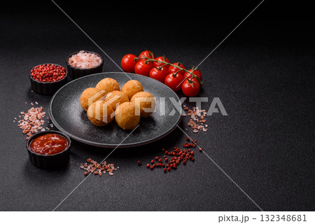 Cheese balls, croquettes or arancini with potatoes or rice. Cheese balls 132348681