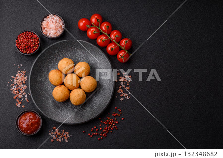 Cheese balls, croquettes or arancini with potatoes or rice. Cheese balls Cheese balls, croquettes or arancini with potatoes or rice. Cheese balls 132348682