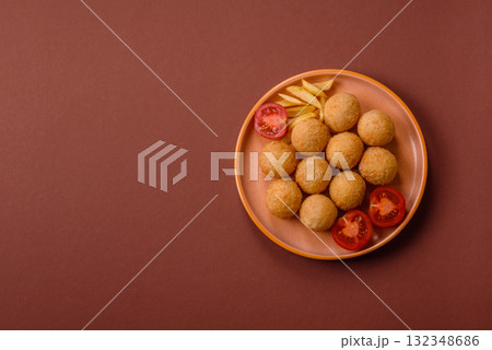 Cheese balls, croquettes or arancini with potatoes or rice. Cheese balls Cheese balls, croquettes or arancini with potatoes or rice. Cheese balls 132348686