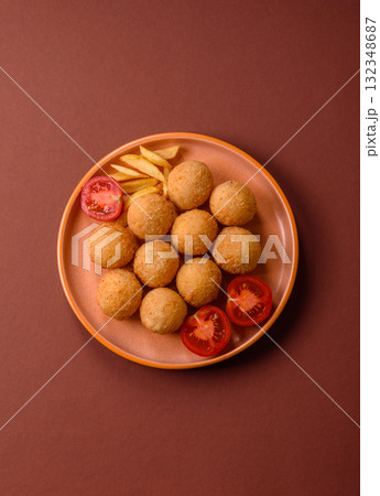 Cheese balls, croquettes or arancini with potatoes or rice. Cheese balls 132348687