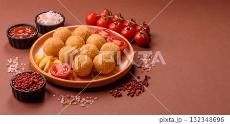 Cheese balls, croquettes or arancini with potatoes or rice. Cheese balls Cheese balls, croquettes or arancini with potatoes or rice. Cheese balls 132348696
