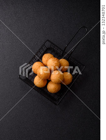 Cheese balls, croquettes or arancini with potatoes or rice. Cheese balls Cheese balls, croquettes or arancini with potatoes or rice. Cheese balls 132348701
