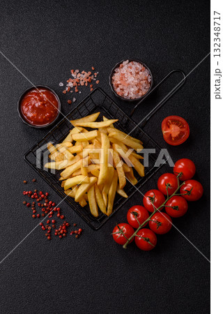 French fries, chips or snack with sauce as food background. French fries French fries, chips or snack with sauce as food background. French fries 132348717