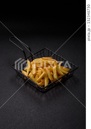 French fries, chips or snack with sauce as food background. French fries French fries, chips or snack with sauce as food background. French fries 132348730