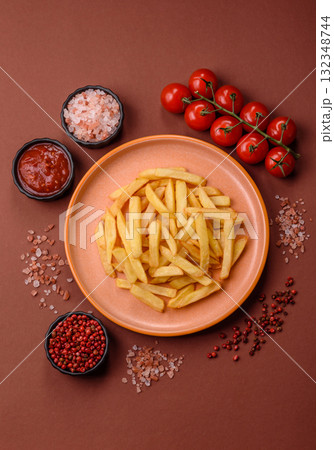 French fries, chips or snack with sauce as food background. French fries French fries, chips or snack with sauce as food background. French fries 132348744