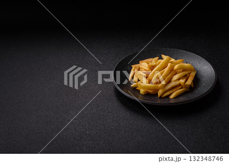 French fries, chips or snack with sauce as food background. French fries French fries, chips or snack with sauce as food background. French fries 132348746