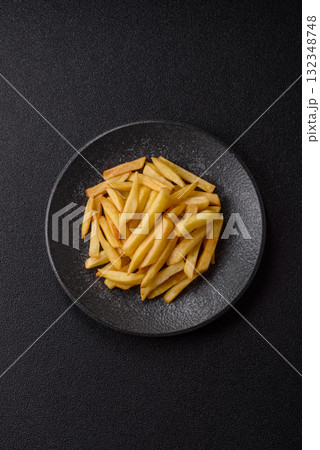 French fries, chips or snack with sauce as food background. French fries French fries, chips or snack with sauce as food background. French fries 132348748
