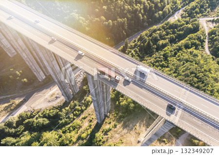 cargo delivery trucks drive on highway aerial top view 132349207