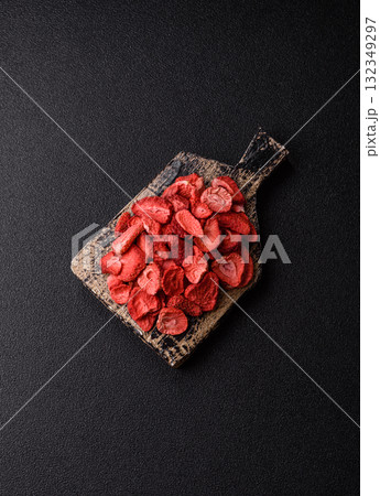 Dried sublimated slices of strawberry as an ingredient for sweet desserts. Dried strawberry Dried sublimated slices of strawberry as an ingredient for sweet desserts. Dried strawberry 132349297