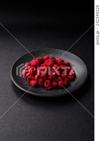 Dried sublimated slices of raspberry as an ingredient for sweet desserts. Dried raspberry Dried sublimated slices of raspberry as an ingredient for sweet desserts. Dried raspberry 132349326